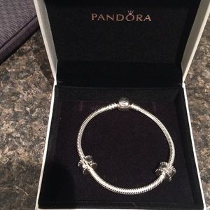 Silver pandora bracelet with 2 clips